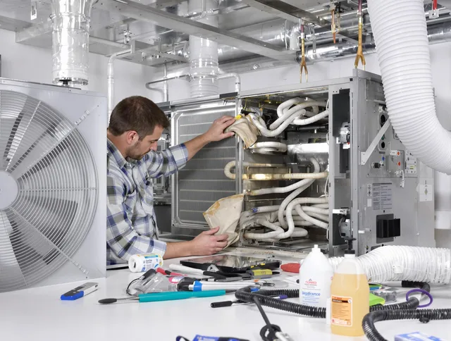 Concord Air Duct Cleaning specialist performing precision AC coil cleaning in Concord