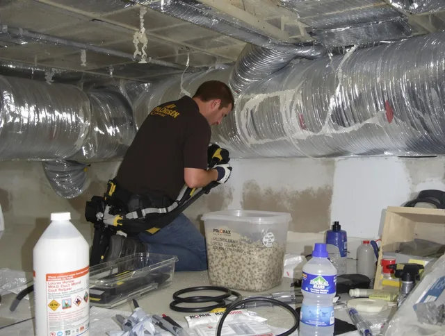 Concord Air Duct Cleaning specialist performing professional mold removal from air ducts in Concord