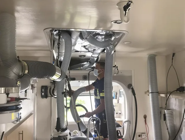 Concord Air Duct Cleaning specialist performing precise mobile home duct cleaning in Concord