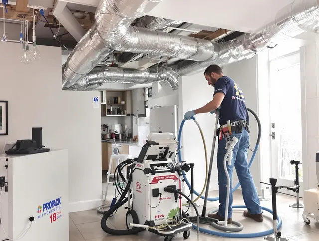 Concord Air Duct Cleaning technician performing advanced pure duct cleaning with specialized equipment in Concord